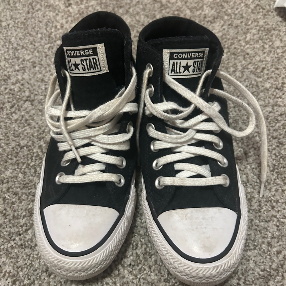 Black midtop converse